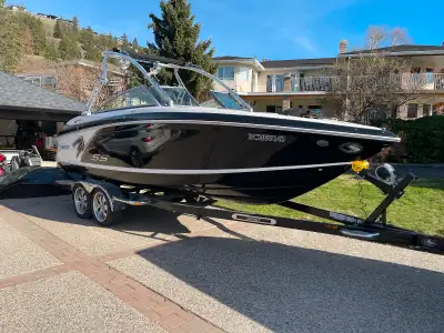 8.2L Mercruiser, flushable head, perfect pass, table, EZ loader trailer, mooring cover, snap on cove...