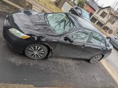 Toyota Camry Hybrid 2009 247,000km Roule bien, air climatisé fonctionne, batterie neuve!
