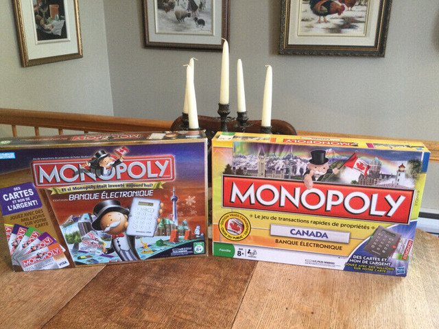 Monopoly 2 éditions différentes de Banque Electronique  8ans + dans Jouets et jeux  à Laval/Rive Nord