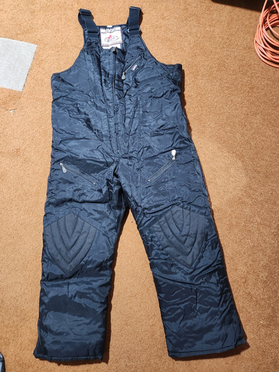 Bib-style snowmobile pants. Worn very few times for short durations, usually when snow-blowing and l...