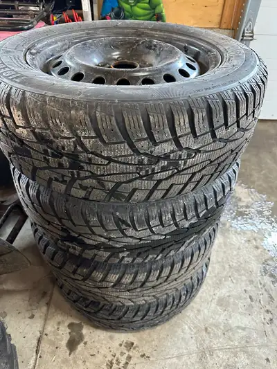 Set of 4 winter tires on rims used one season 215/60R16 no plugs or repairs wheel spec 108mm
