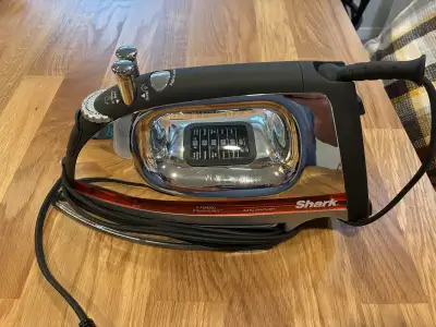 Iron and ironing board, View more