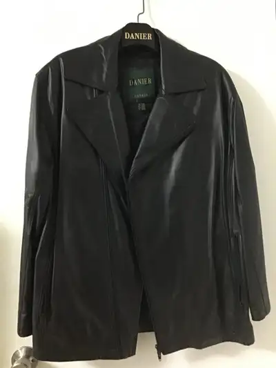 Check out this used Danier genuine leather jacket, designed in Canada for ultimate comfort and durab...