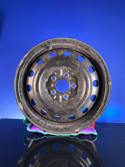 Set of 4 metal (steel) car wheel rims in good used condition. These rims are straight, solid, and st...