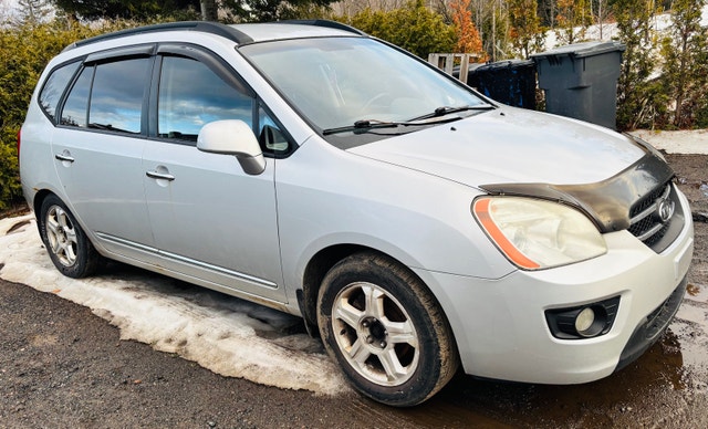 Kia Rondo EX 2008 — photo 2