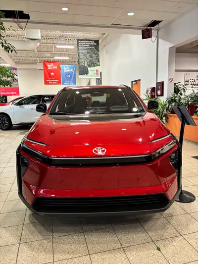 Feast your eyes on the brand new, all-electric Toyota BZ4X 2026, this one showcasing a vibrant red e...