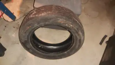 Bridgestone Turanza P225/60/R17 tire for sale with decent tread but it is older so i'm selling it as...