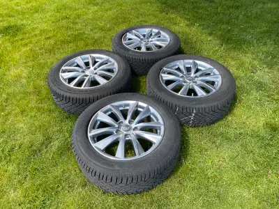 Infiniti Q50 Winter Tires on Factory Rims. Continental Viking Contact 7 225/55 R17. From a 2022 Infi...
