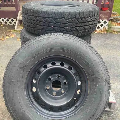 4– M & S- LT- 275- R 70/ 17” snow tires on new 17” rims in like new condition will fit Chevy / GM —....