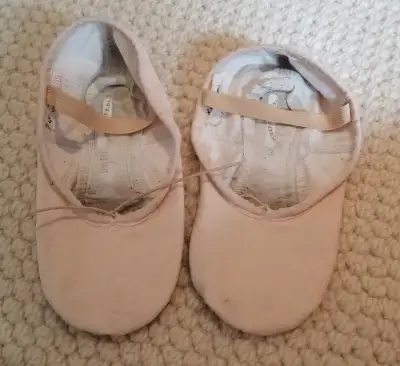 Pink canvas ballet slippers with leather sole and elastics - fit ladies shoe size 6-7 Worn for 1/2 a...