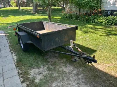 50inch by 98inch box 3500 lb axle 15 inch tires 2 inch ball Lights work Steel floor Tires rims and b...
