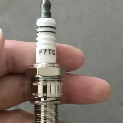 Lawn mower spark plugs