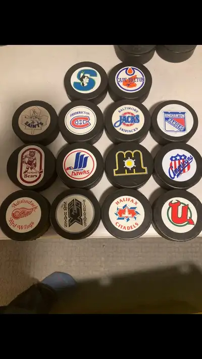 Hockey pucks rare AHL set, View more