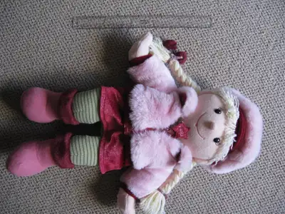 Pink doll with long pig tails and super soft pink zipped jacket, View more