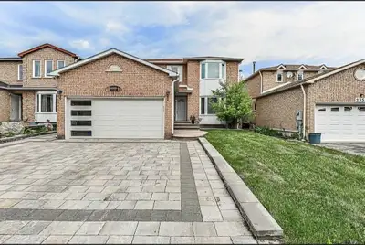This bright and functional basement apartment features a clean layout with modern laminate flooring...