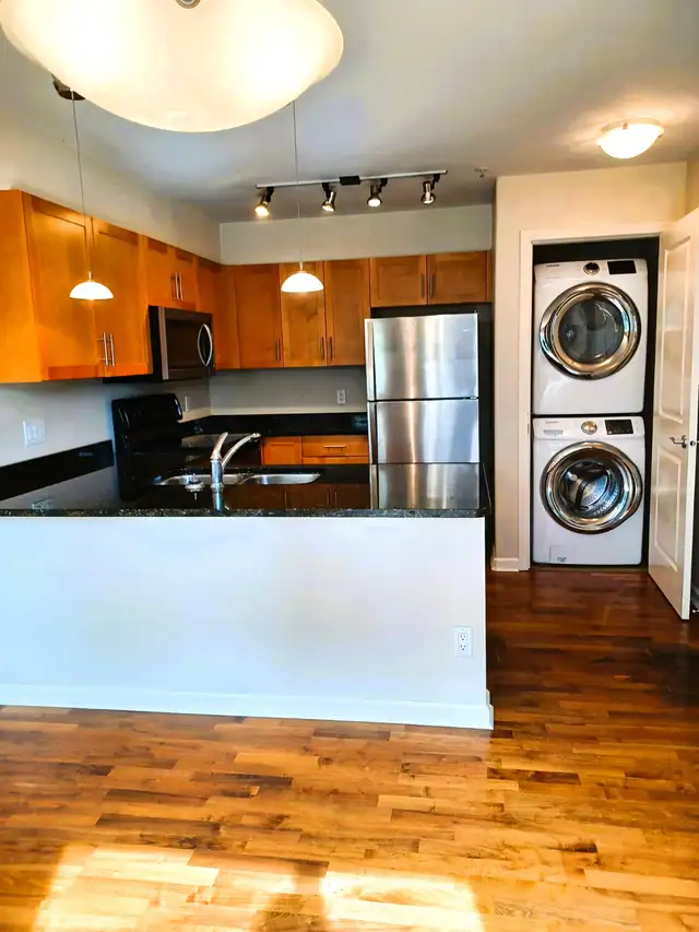 Bright & Sunny corner unit with private patio- Available now!