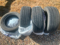Set of 4 great tires rated for mud and snow