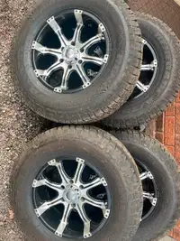 LT285/70R17 wrapped with Radar Renegade A/T 5 like new