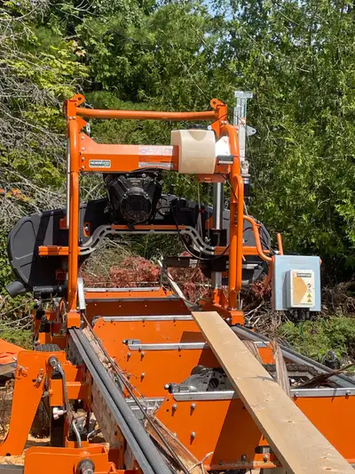 Very good mill low hours with trailer package and 4ft extension. Capable of sawing logs up to 38 inc...