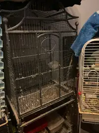Black bird cage on stand