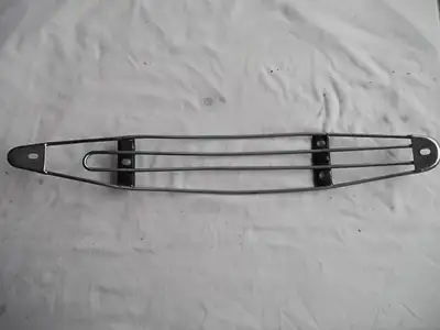 For sale: Suzuki TS250 Exhaust Pipe Heat Shield.... I have a heat shield in good condition..... It l...