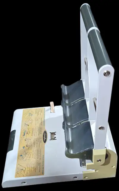This is a new, commercial grade paper hole punch. It was purchased and used (?) by government. The c...
