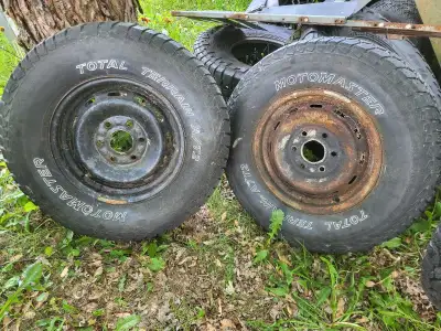 GMC 6 BOLT RIMS. 6 x 139.7. Three Tires hold air. They are weather cracked. Rims all look ok other t...