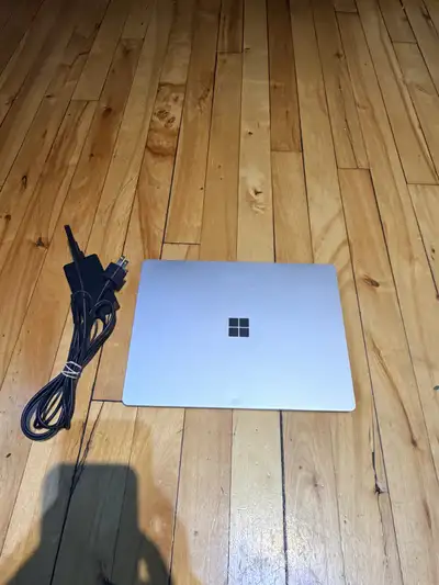 Microsoft laptop go model 1943 , View more