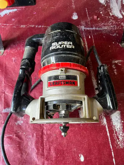 Craftsman router and table + 10 piece 1/4-in JOBMATE router bit sets. Router set works really well,...