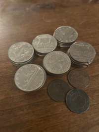 30 Canadian nickel dollars between the dates of 68 and 86 