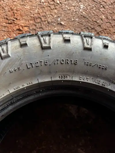 For sale is a used LT275/70R18 tire. Please review the images carefully to assess the condition, as...