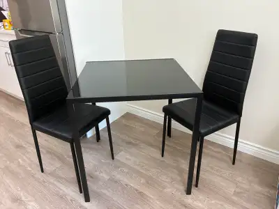 ALMOST NEW 3-piece dining table and chairs, View more