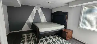 Large room for rent in a walkout basement. King size bed. Shares bathroom with another housemate. Ut...