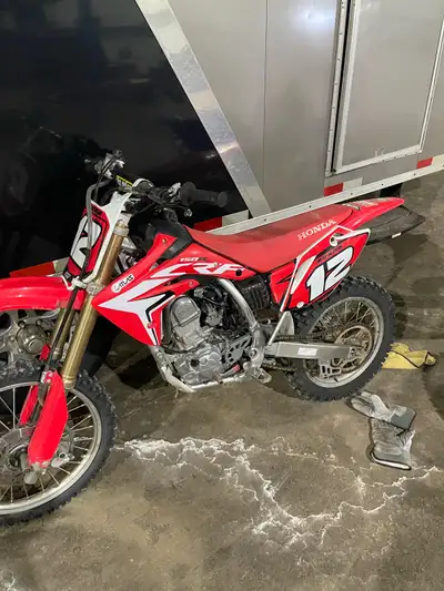 Good shape. Only raced a few times. 2021 CRF 150 R. Big wheel