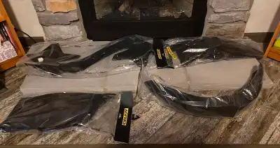 Kit with both fenders, radiator shrouds and side numbers plates, black in colour. Brand New, still i...