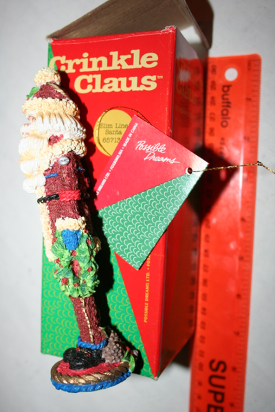 Pic #1 = collector's Crinkle Clause new in box =$25, pic #2 = pewter angel mantel stocking holder an...