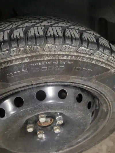 Goodyear Ultra Grip winter tires, set of 4. Size 235/60R18, mounted on steel rims. $200 OBO. Please...