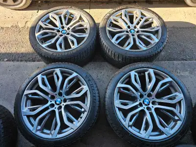 Selling 4 original 21 inches BMW X5 rims with Michellin pilot Alpin winter tires on them. Rims have...