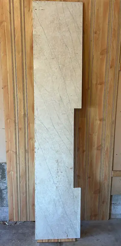 Large marble like material slab. 8' long and 19" deep with one cutout. Needs to be cleanup ... store...