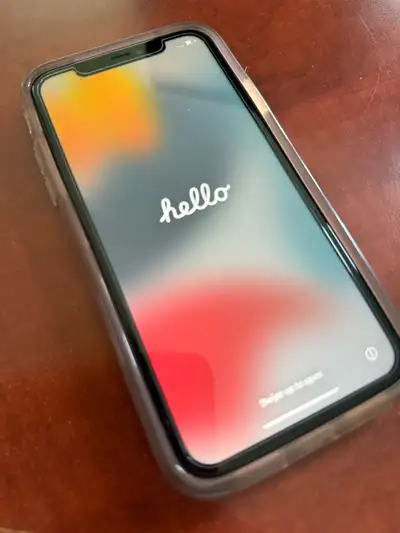 iPhone 11. Black in color, 64 GB. Battery life is 73%