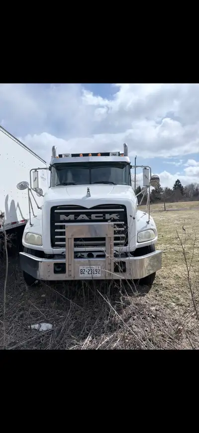 This 2013 Mack dump truck is a robust and reliable workhorse ready to tackle your toughest hauling p...