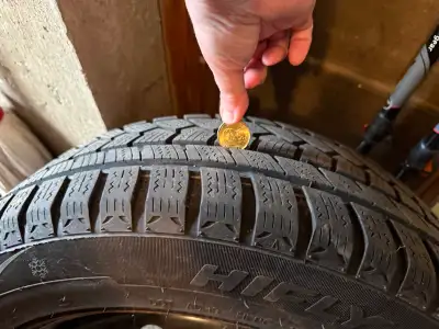 4 Winter tires on metal rims used 2 seasons - these tires were on a Honda Accord Sport .The car is s...