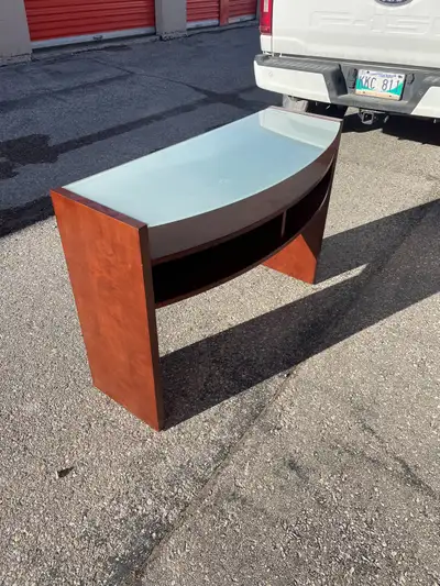 This is a Palliser sofa table with a sleek design, perfect for adding a touch of elegance to your li...