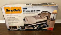 Safe. Under bed or for the trunk of the SUV