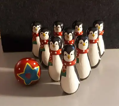 10 penguin painted bowling pins. Their cute little faces. Set them up like a real game or scatter th...