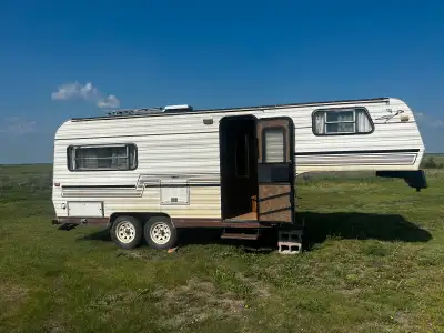 20ft 5th wheel trailer in good clean condition ready for summer camping everything inside works good...