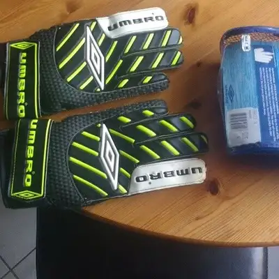 Soccer shin & ankle pads, goalie gloves and watch, View more