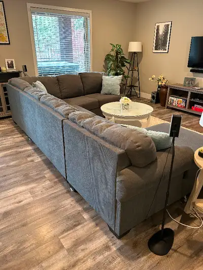 Cloth Sectional in as new Condition. Used in lower Walk out level when company stayed over. Always c...