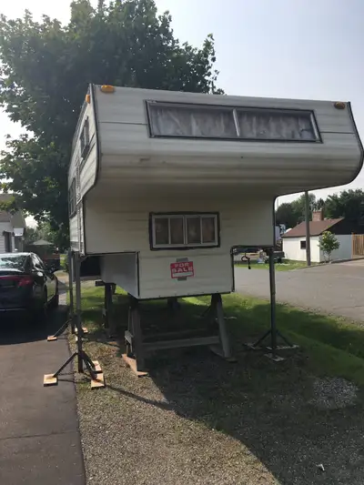 Mint shape truck camper. New fridge. Stored inside over winters