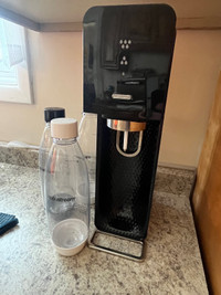 Soda stream with extra bottles and refill